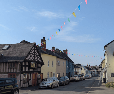 Bunting crisscrosses the road in Bishop's Castle.