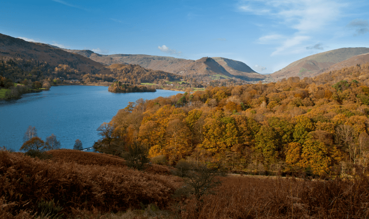 Views over the autumnal trees to the lakes on the South Lakes Short Break.