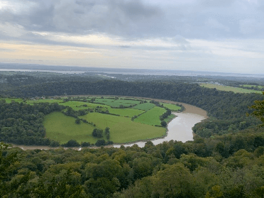 Views out over a wide and slow-moving turn of the river.